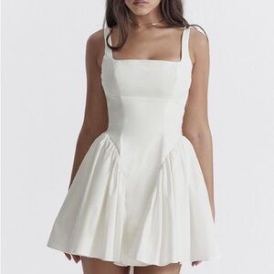 Elegant White Backless Dress with a bow